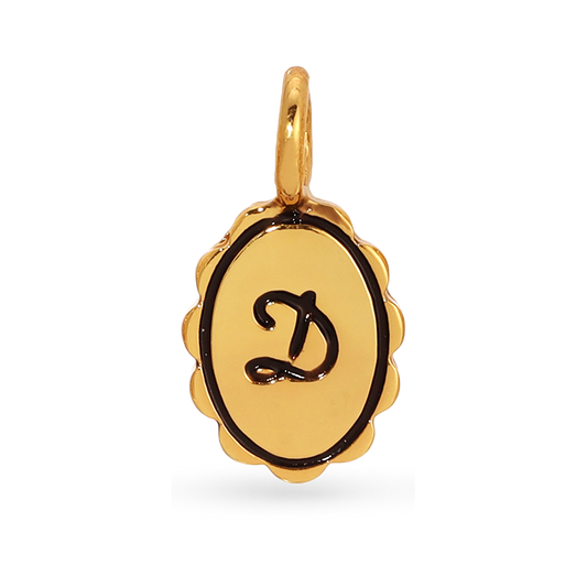 A golden charm with the letter D on it.