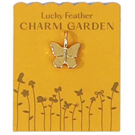 Butterfly charm on a 'Lucky Feather Charm Garden' card.