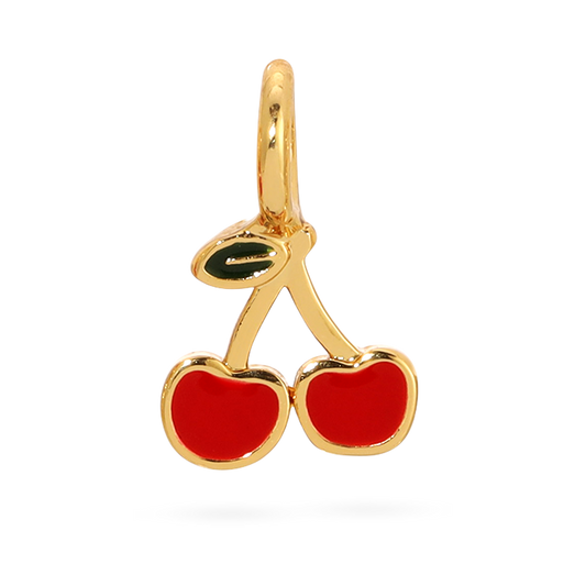 A gold-toned metal charm depicting a pair of red cherries hangs from a loop.