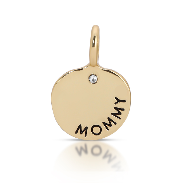 A gold charm pendant with the word "mommy" inscribed.