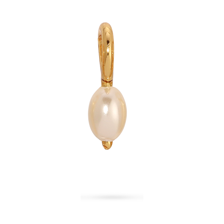 Close-up of a gold earring with a pearl charm.