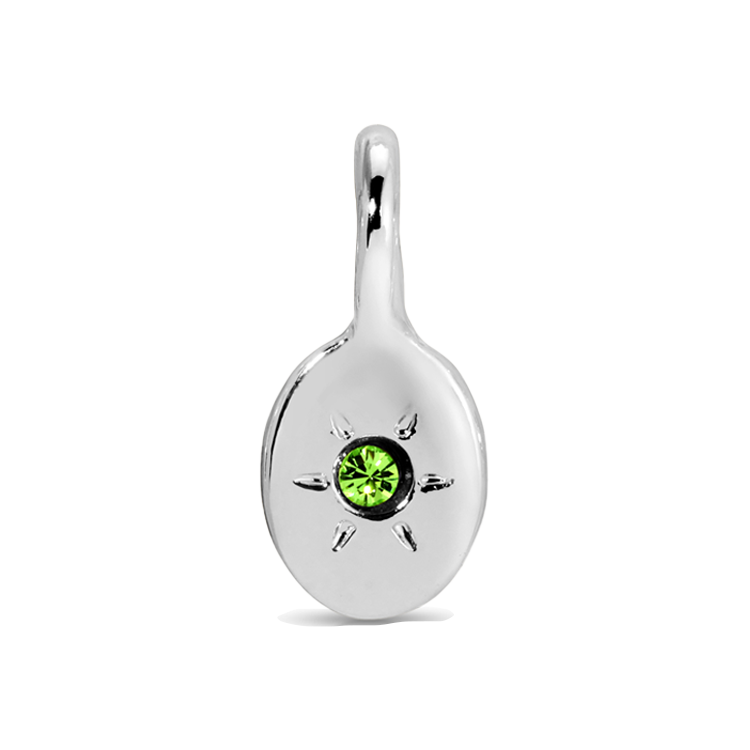 A silver pendant features a green gem in the center of a starburst design.