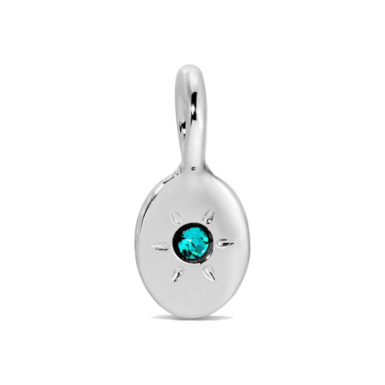 A shiny silver pendant with a teal gemstone.