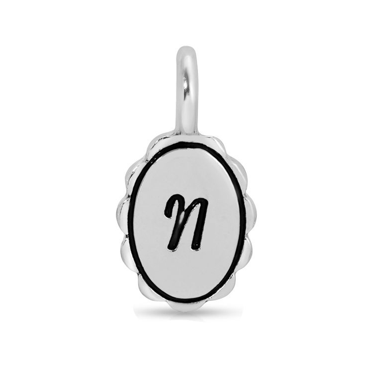 A silver pendant with the letter "n" on it.