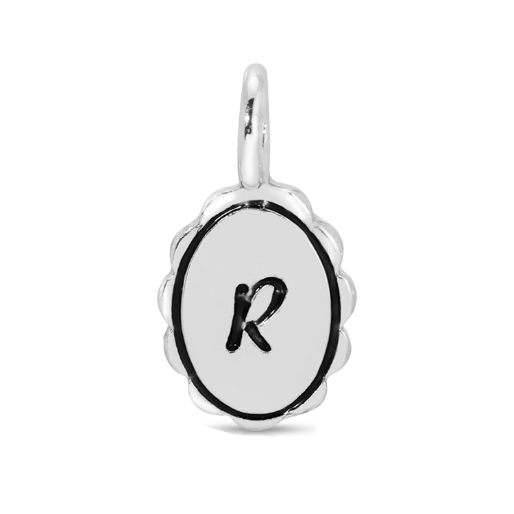 A silver charm pendant featuring the letter "R" in black on a white oval background.