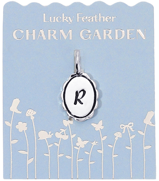 A charm with the letter "R" is displayed on a light blue card with the words "Lucky Feather CHARM GARDEN" and garden-themed illustrations.