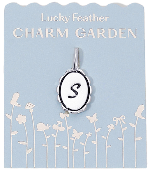 A "Lucky Feather Charm Garden" charm with the letter "S" on a blue card with a floral design.