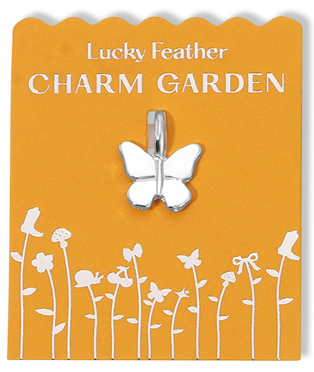 A silver butterfly charm on a yellow card with the words 'Lucky Feather CHARM GARDEN' and images of flowers.