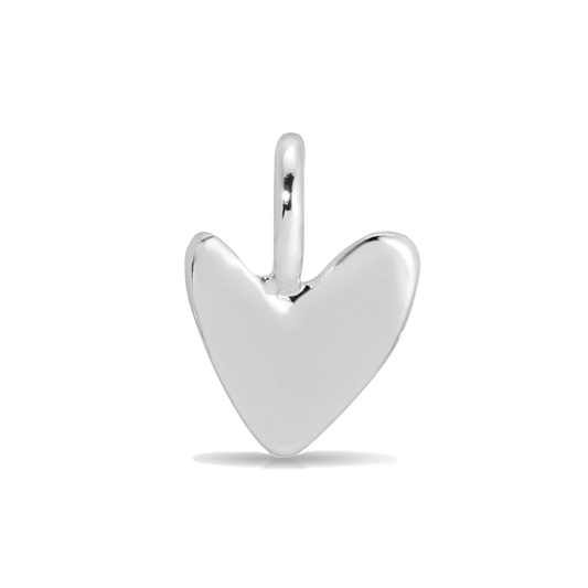 Close-up of a silver heart-shaped pendant with a loop.