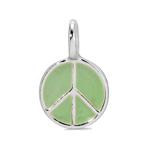 A silver peace sign pendant with light green fill on a black and white background.