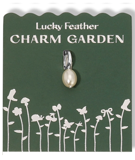 Lucky Feather Charm Garden tag displays a pearl charm with a silver bail and white garden-themed imagery on a green background.