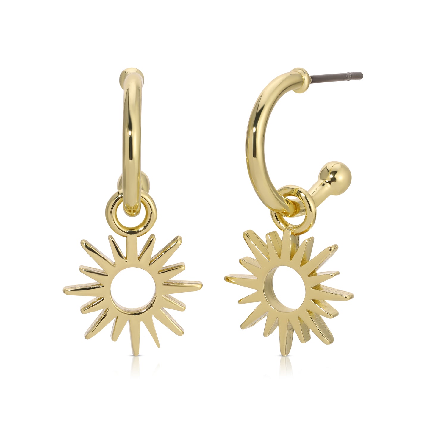 A pair of gold hoop earrings with sunburst charms on a white background.