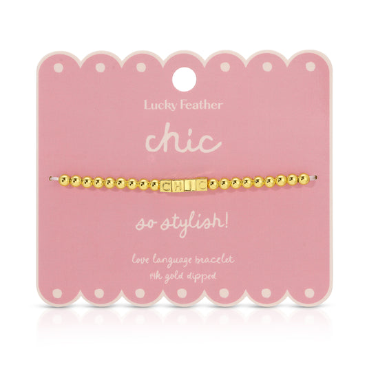 A 'Chic' beaded bracelet is displayed on its pink, scalloped product card.