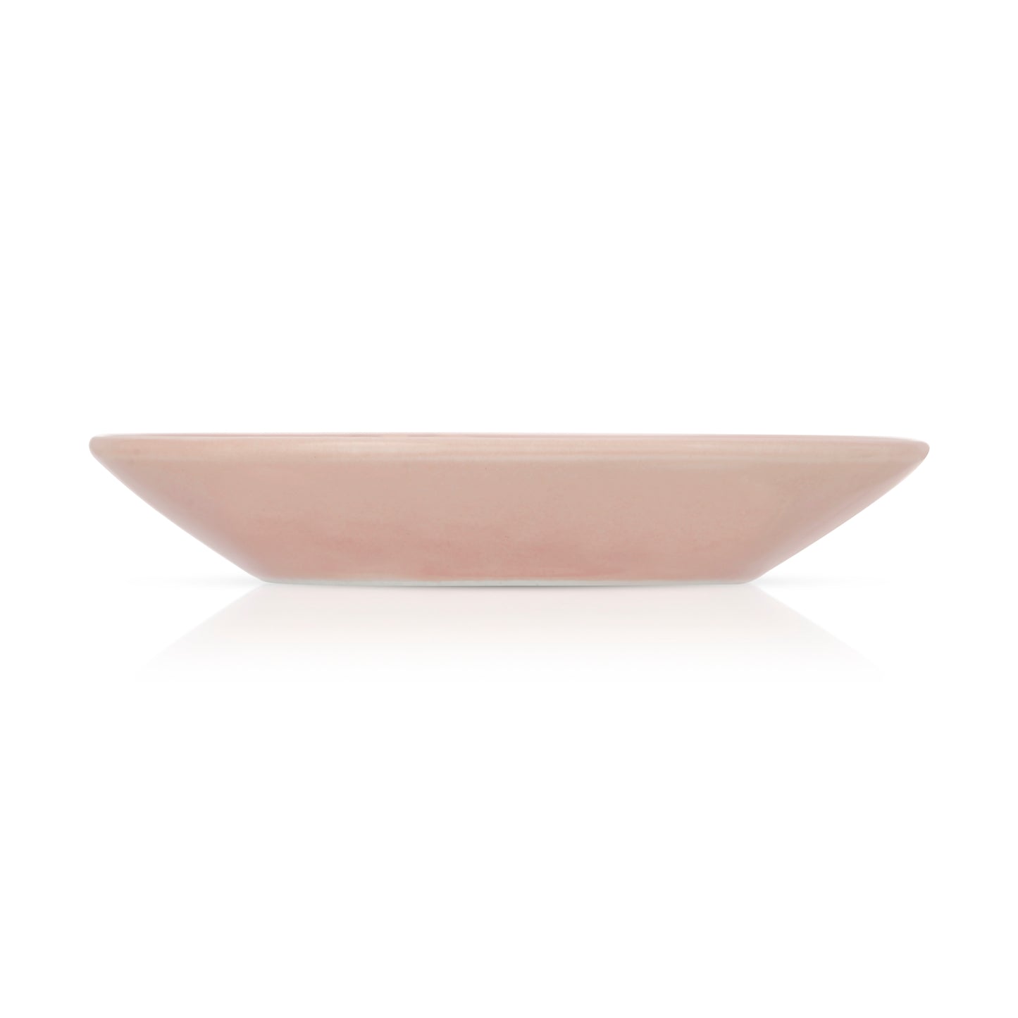 A light pink square ceramic plate is shown on a white surface.