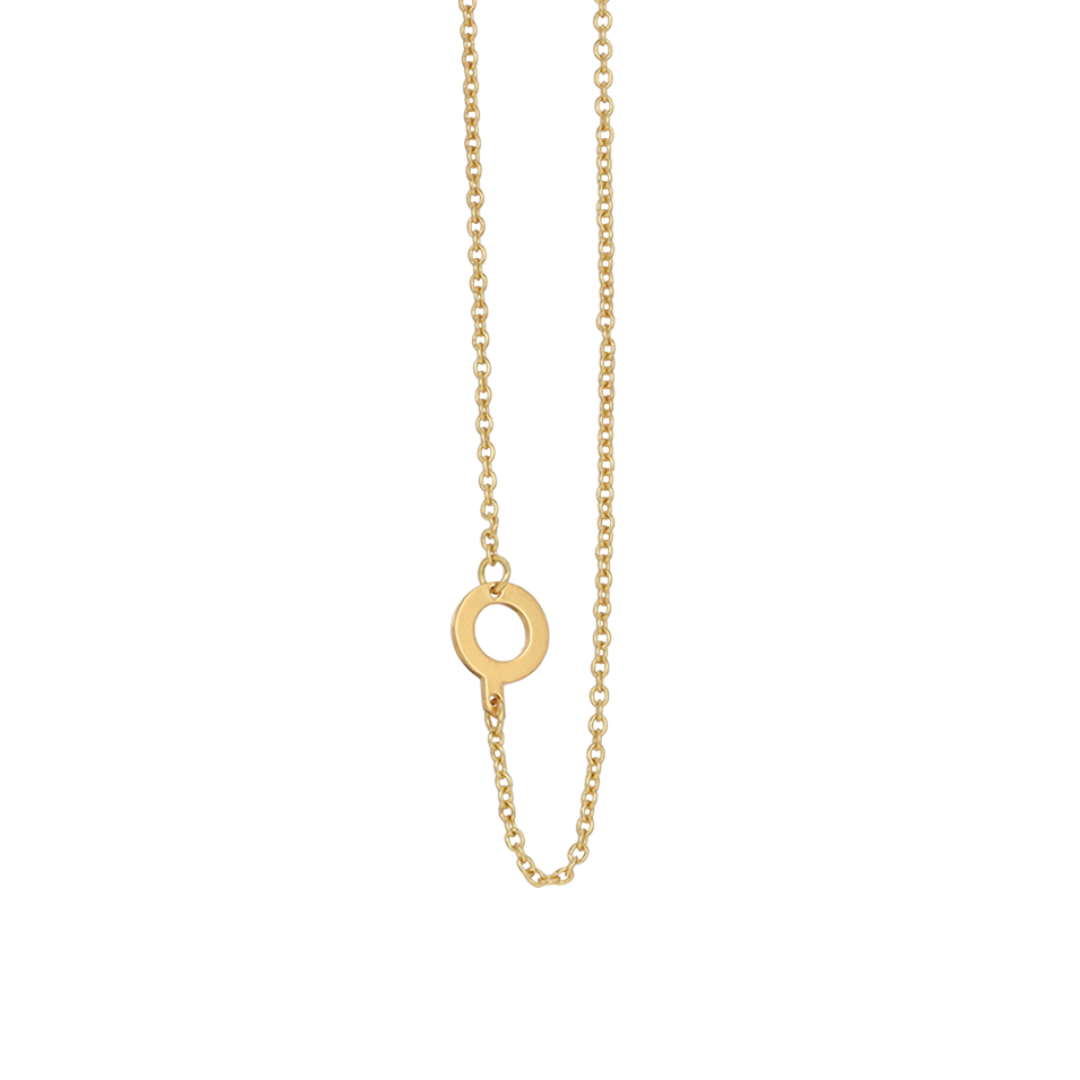 A gold necklace with a circular pendant is centered on a white background.