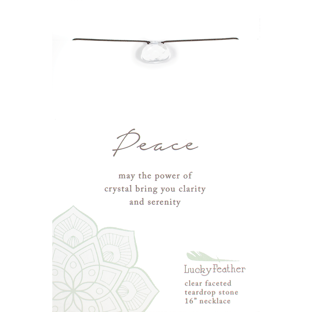 Informational card for a "Lucky Feather" clear faceted teardrop stone necklace, promoting peace.