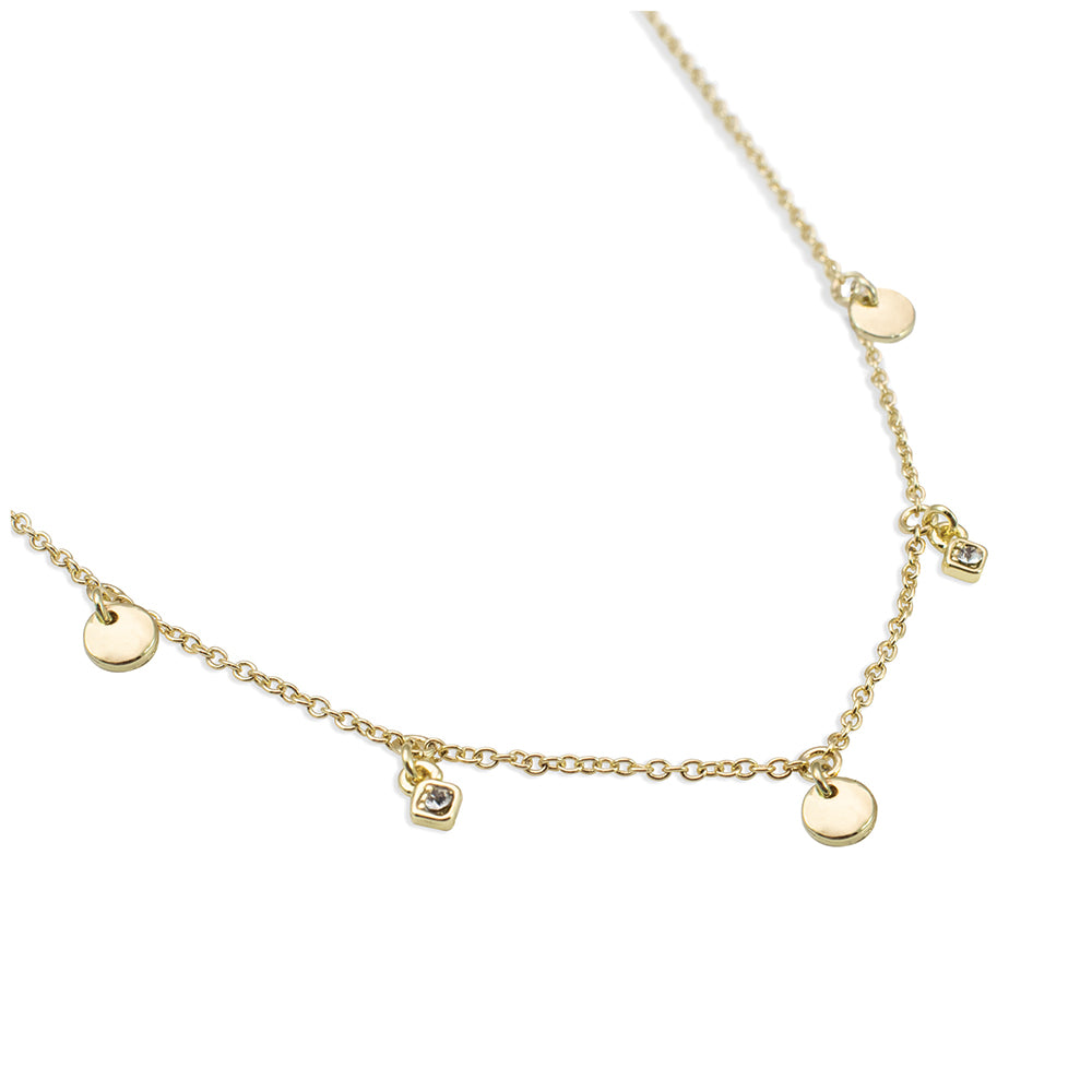 A gold-colored chain necklace with coin and jewel pendants is displayed on a white background.