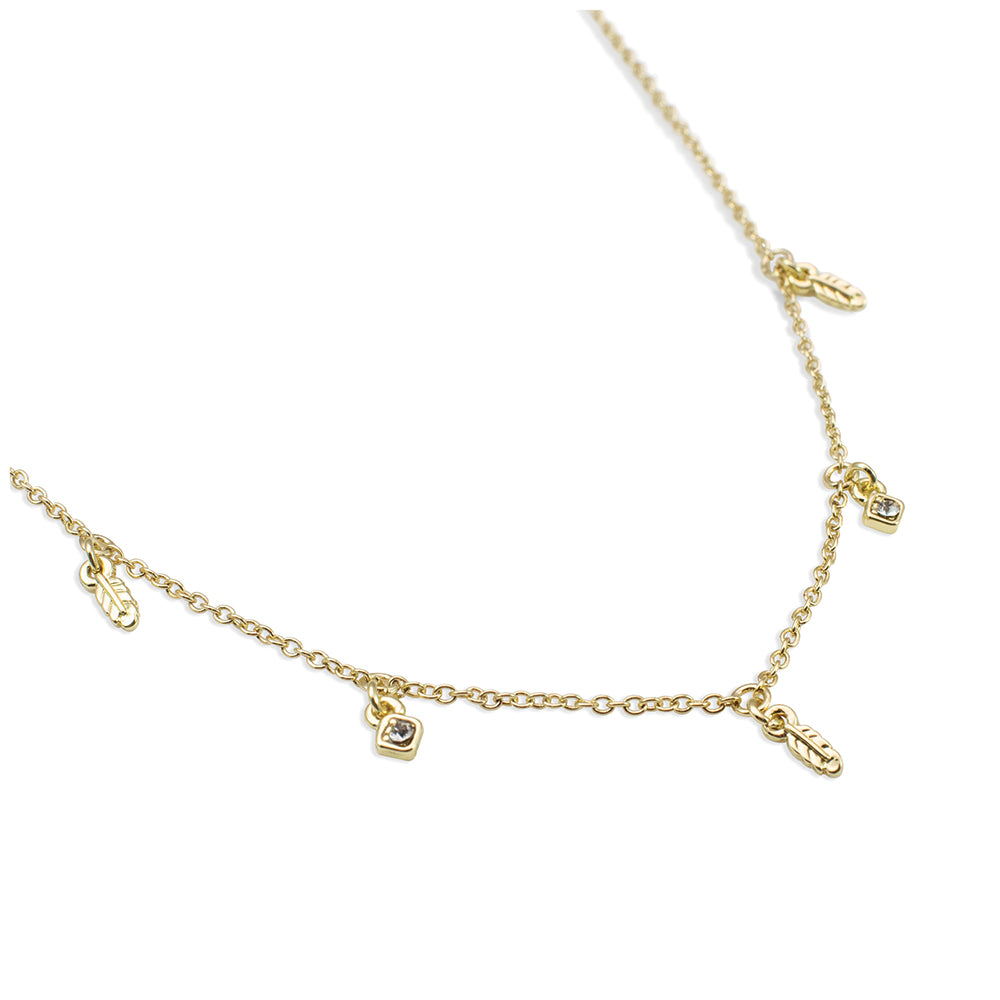 A gold-colored chain necklace with feather and small square charm pendants.