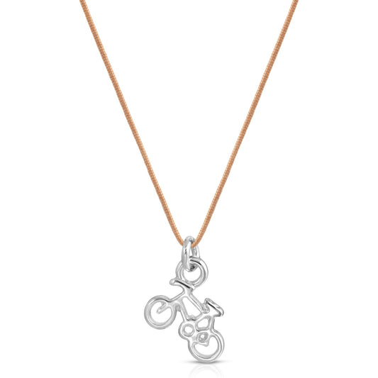 A bicycle pendant necklace on a tan cord.