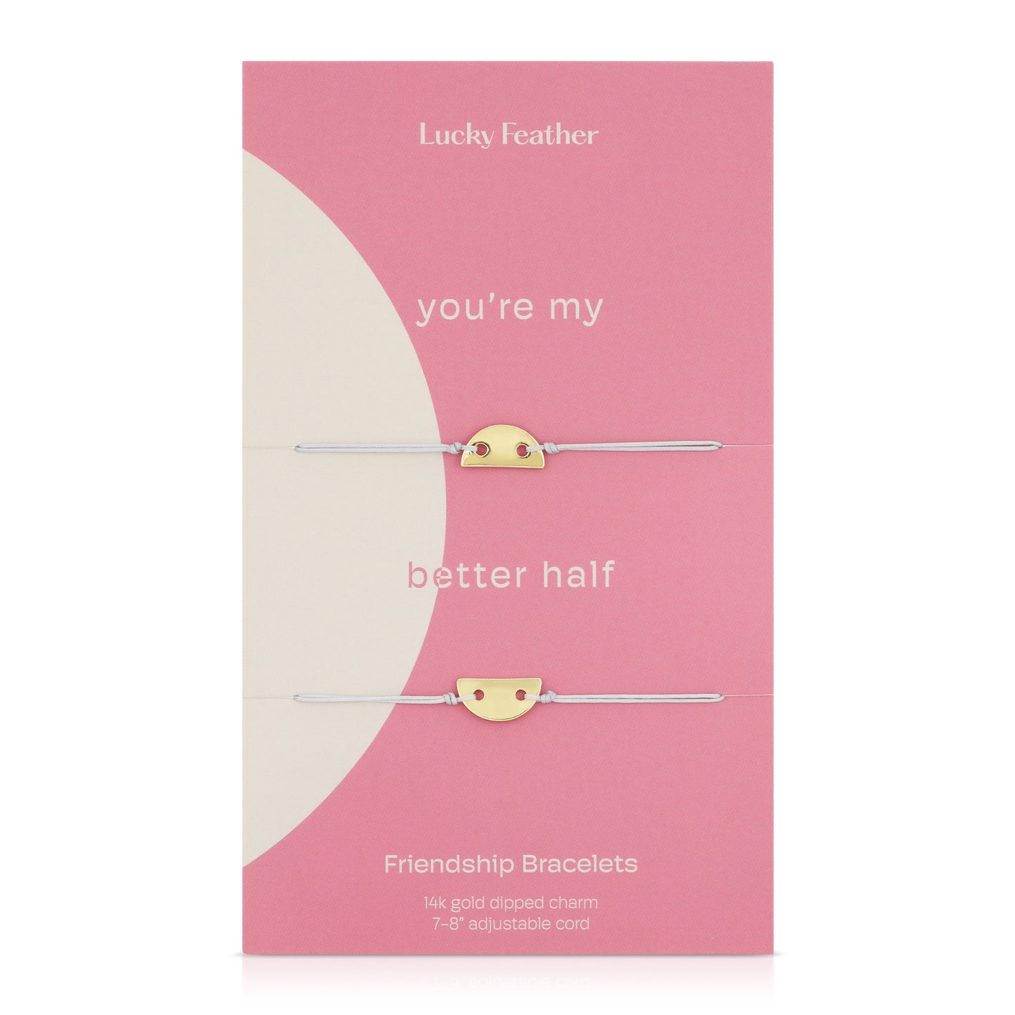 Two friendship bracelets with half-circle gold charms are displayed on a pink and white card labeled "Lucky Feather."