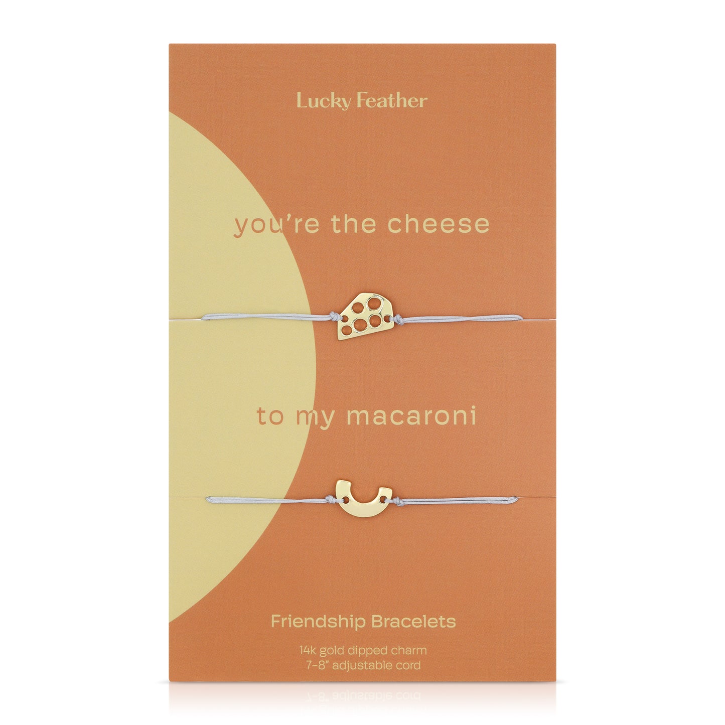 Two friendship bracelets with cheese and macaroni charms are displayed on a "Lucky Feather" branded card.