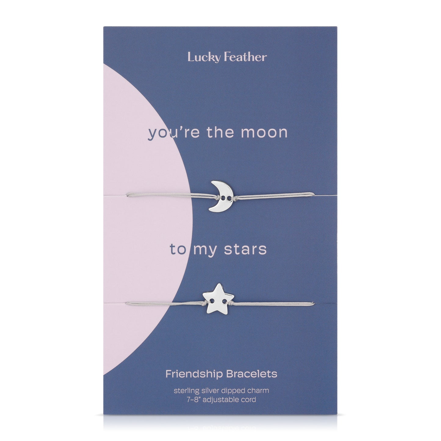 Two friendship bracelets with silver-dipped moon and star charms on a presentation card.