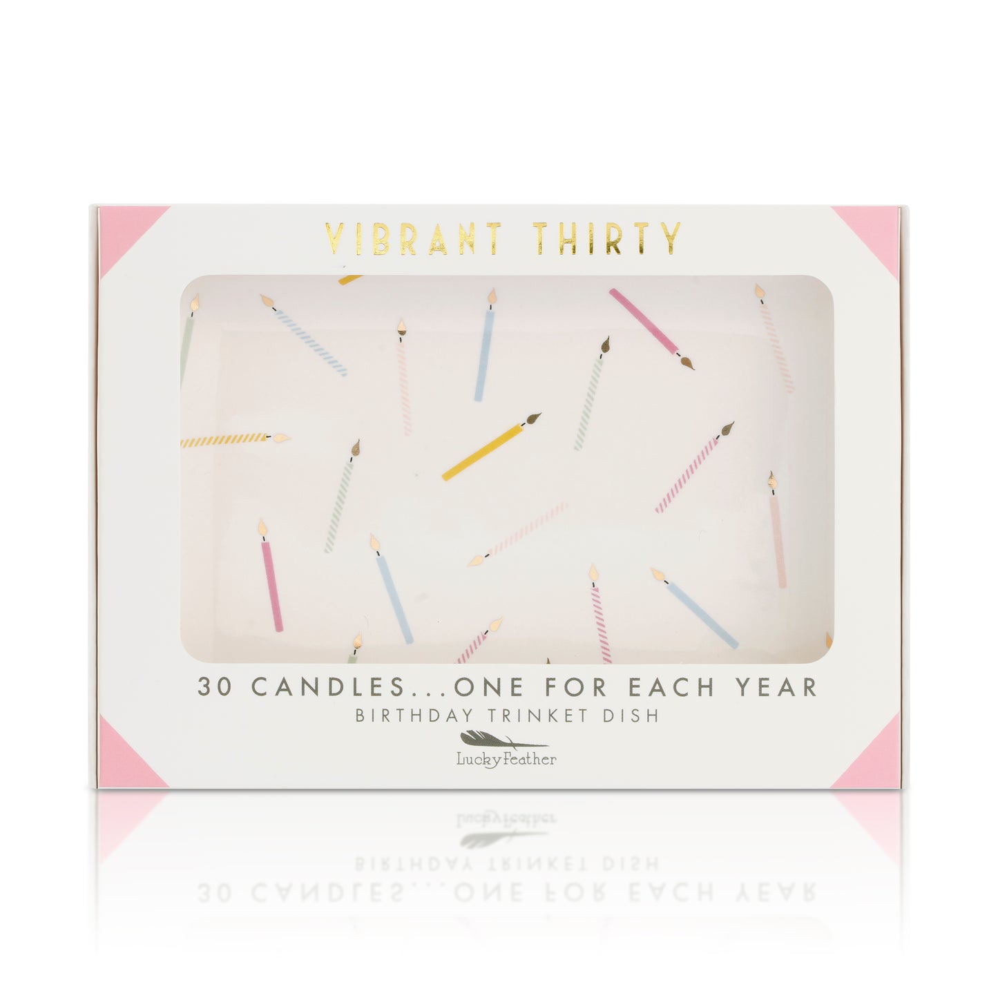 A "Vibrant Thirty" birthday trinket dish box features a window showing a design of scattered colorful candles.