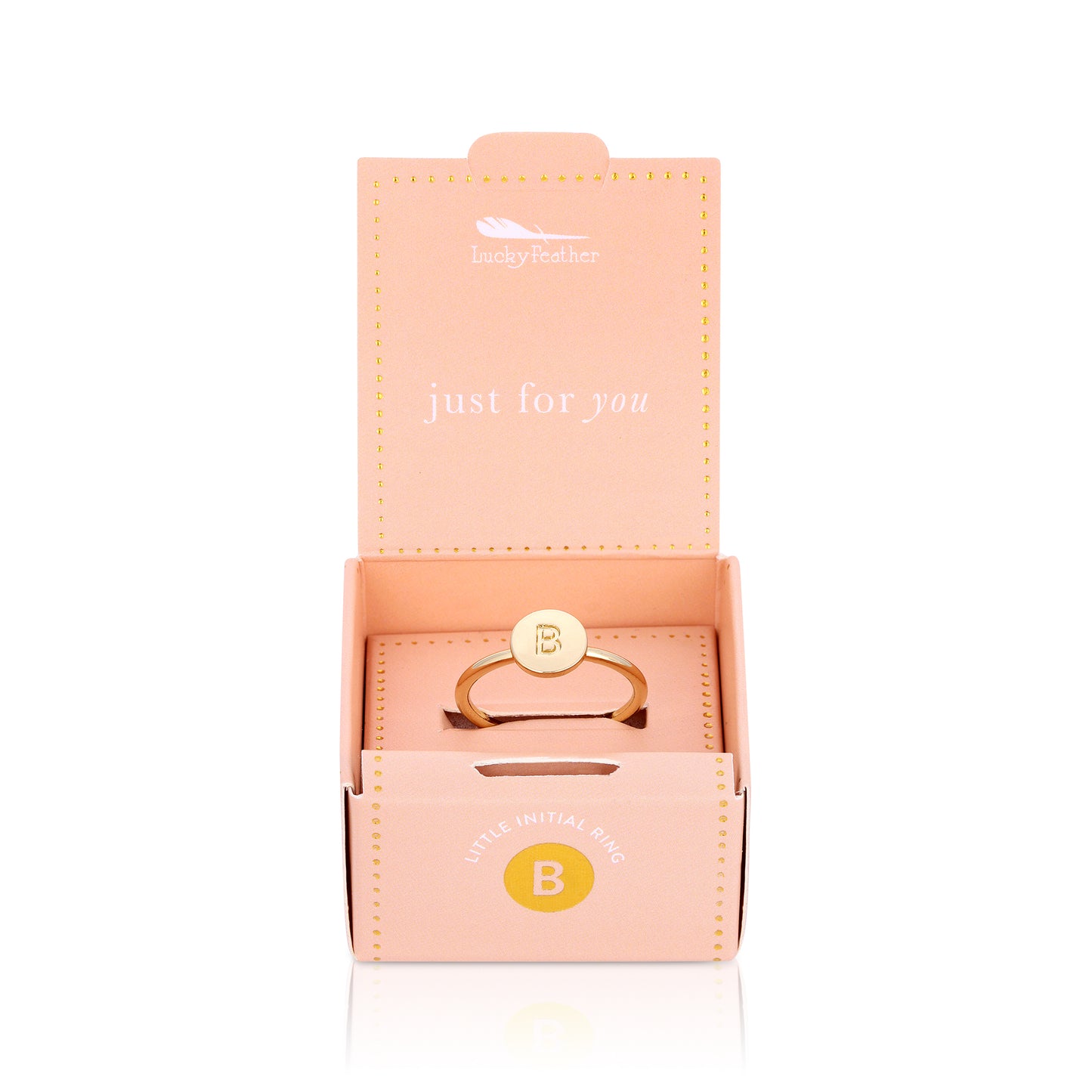 A "Lucky Feather" gift box displays a gold ring with the initial "B".