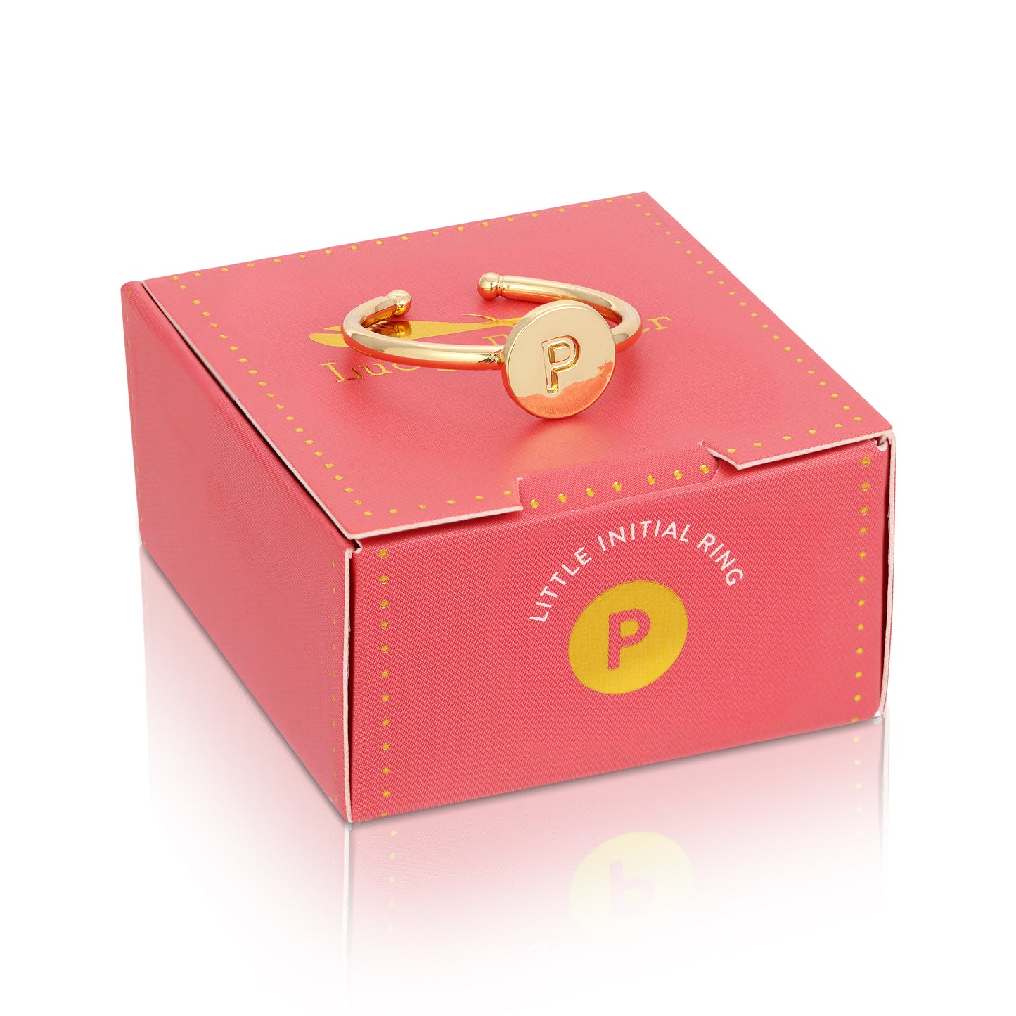 A gold "P" initial ring rests on top of its pink box.