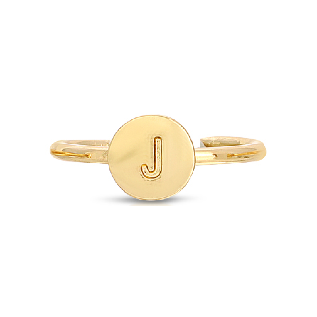 A gold ring displays the letter "J" on a circular face.