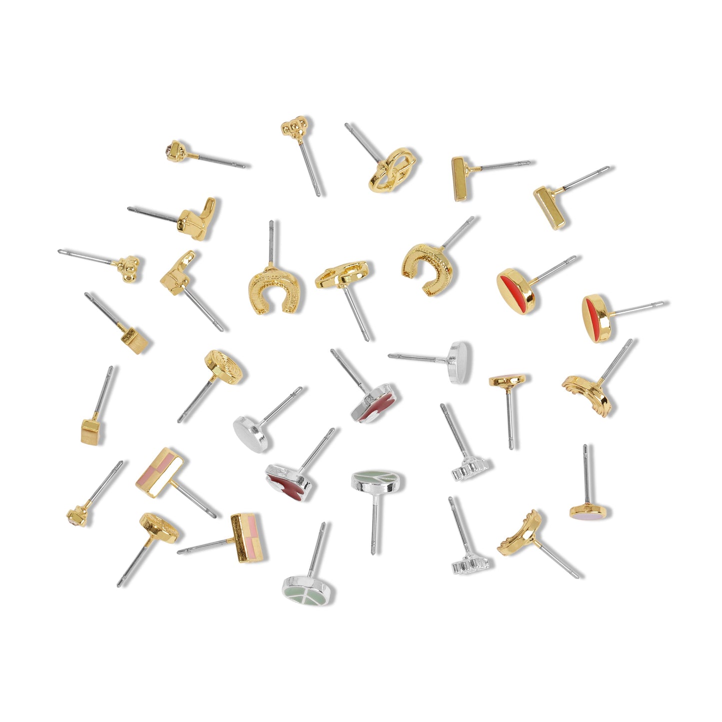 Scattered assortment of stud earrings in varying shapes and colors on a white background.