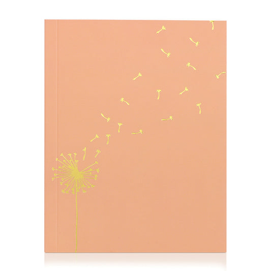 A coral-colored notebook with a gold dandelion and seeds design on the cover.