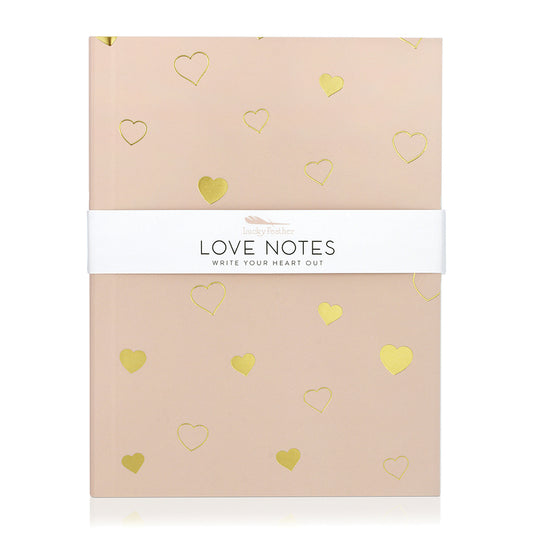 A 'Love Notes' notebook with golden heart illustrations.