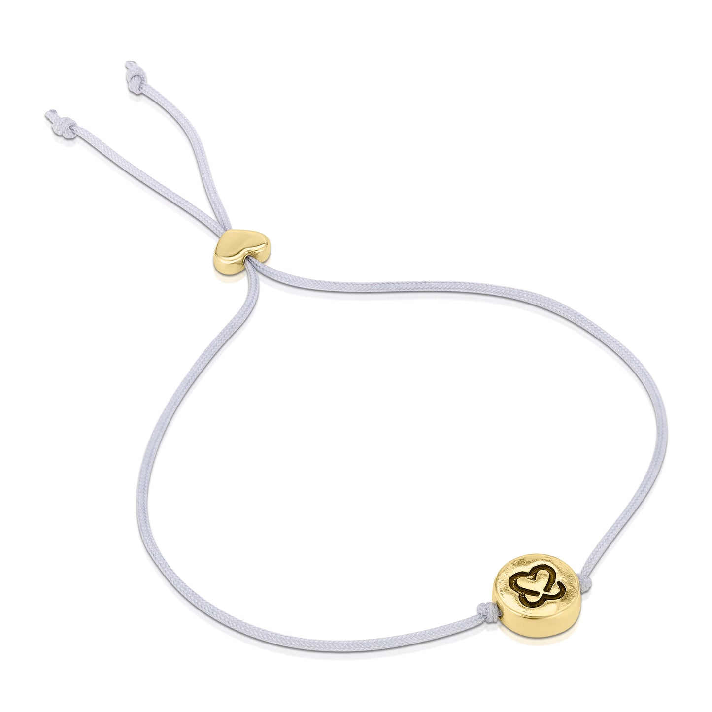 A bracelet with a gray cord and a gold heart-shaped slider and circular charm with a heart design.