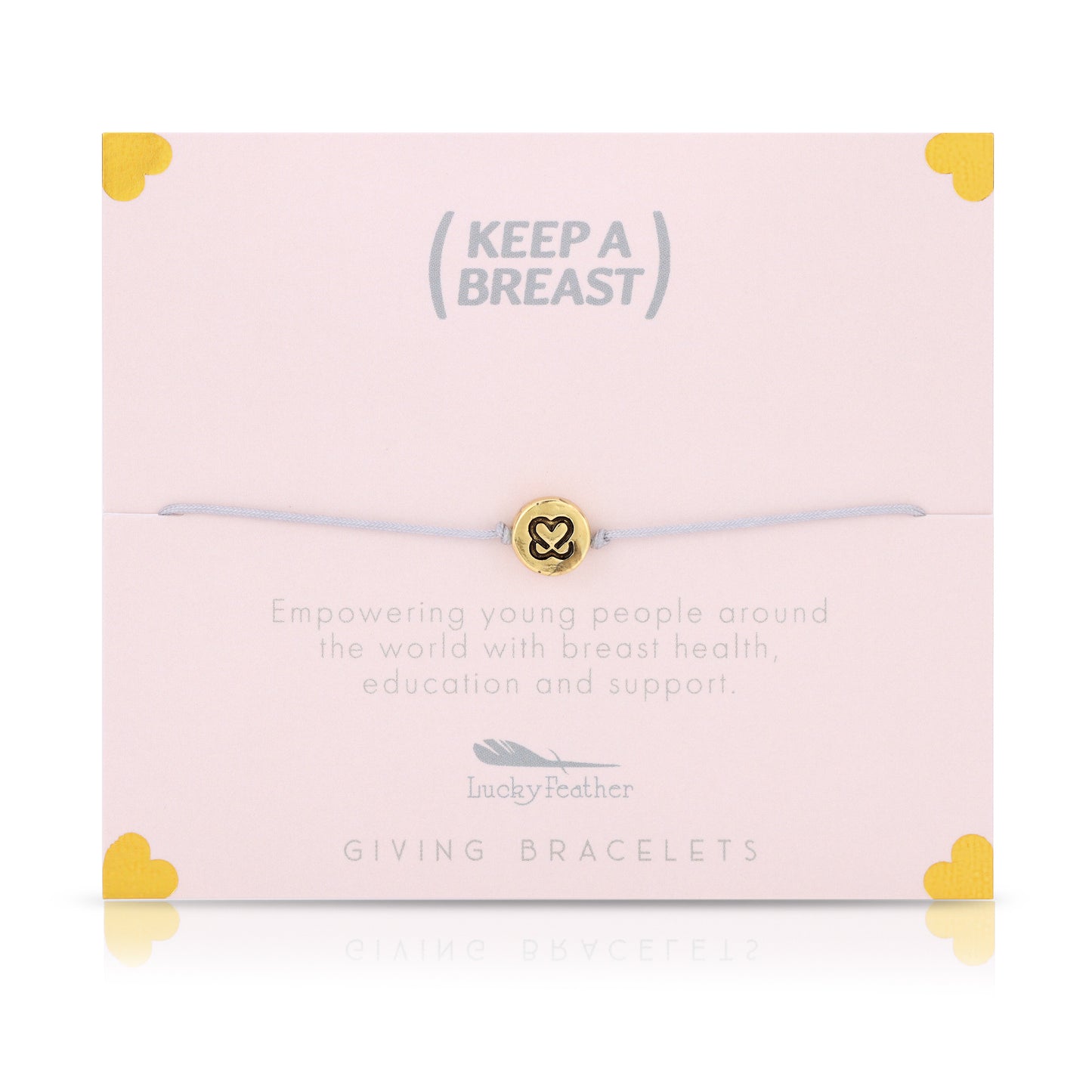 A bracelet with a gold charm sits on a pink card with the text "Keep A Breast," along with details on breast health education and support.