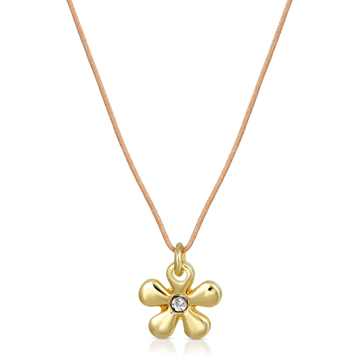 A necklace with a gold flower pendant and a small, clear gemstone on a tan cord.