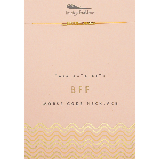 A 'Lucky Feather' necklace with the word 'BFF' and its morse code representation displayed on a pink card.