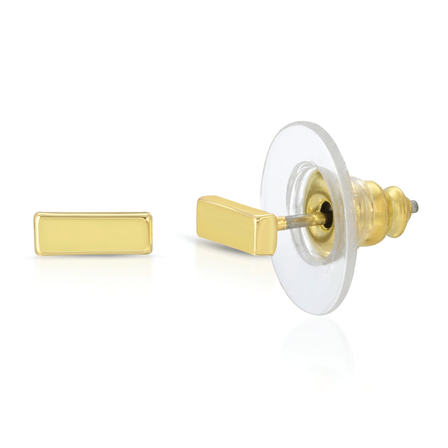 A pair of gold rectangular stud earrings, one with a clear plastic and gold metal backing, are displayed on a white surface.