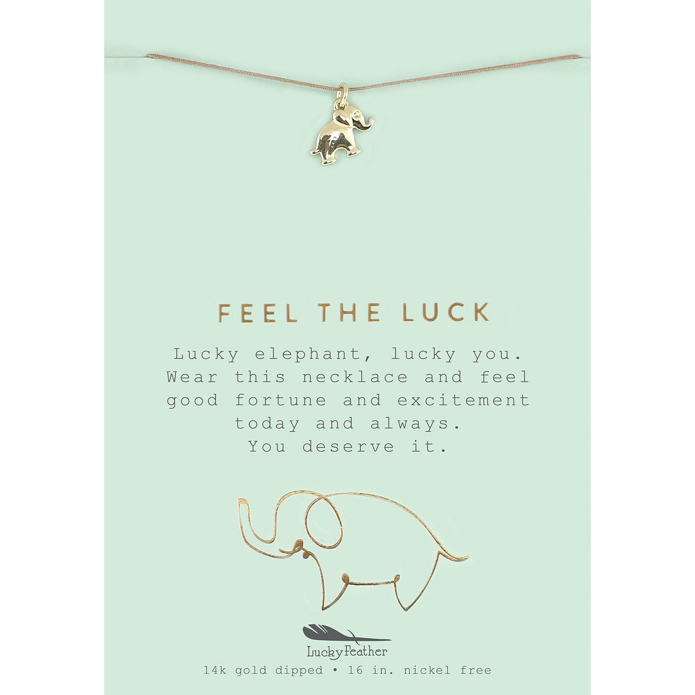 A lucky elephant necklace hangs on a card with the words "Feel the Luck."