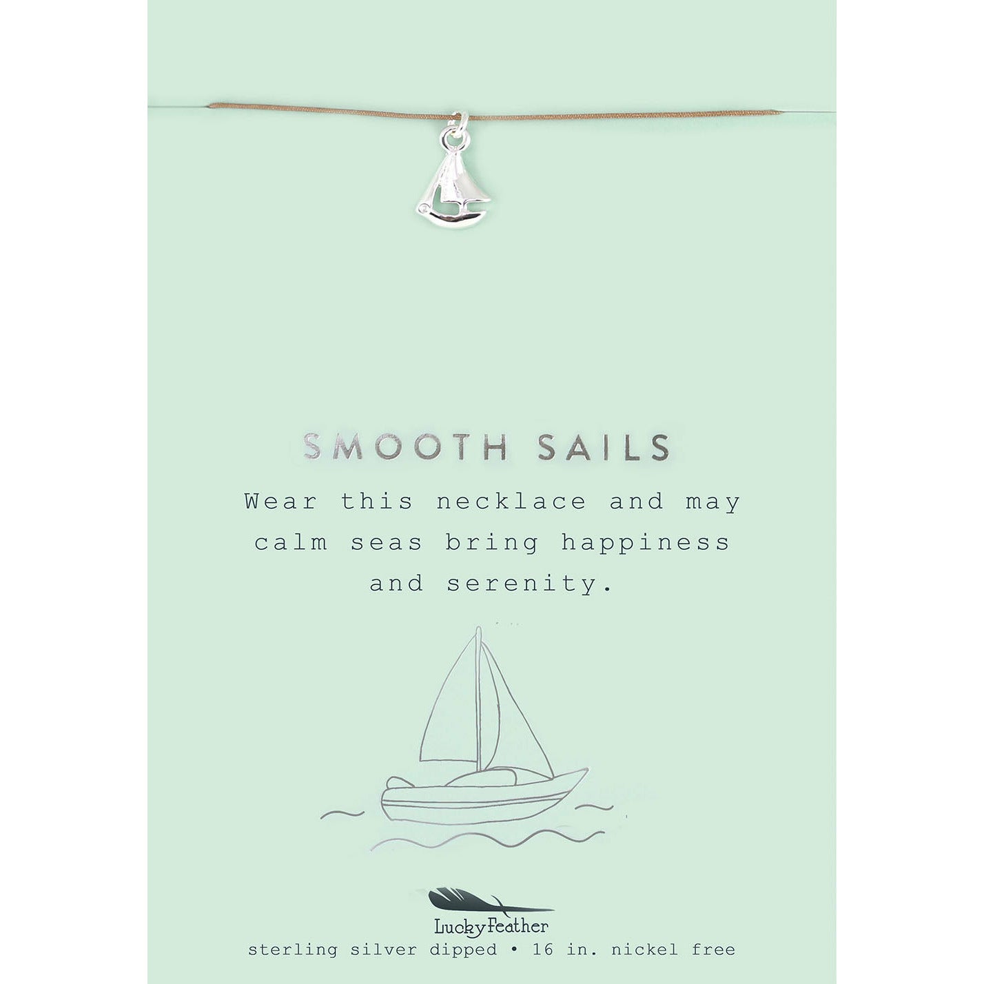 A silver sailboat charm necklace hangs on a card with a sailboat illustration and the phrase "Smooth Sails."