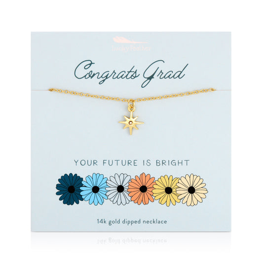 A 14k gold dipped necklace with a star pendant displayed on a light blue card that reads 'Congrats Grad' and 'Your Future is Bright' above a row of six colorful daisy illustrations.