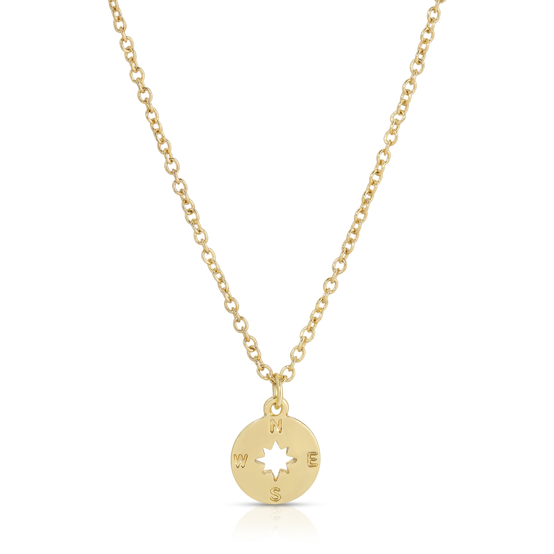 A gold chain necklace with a compass pendant is on a white background.