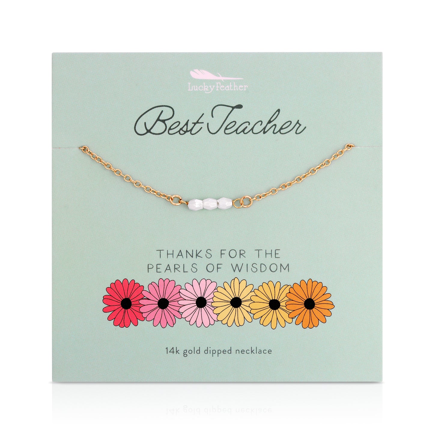 Gold-toned necklace with three white beads on a card that reads "Best Teacher" with flowers at the bottom.