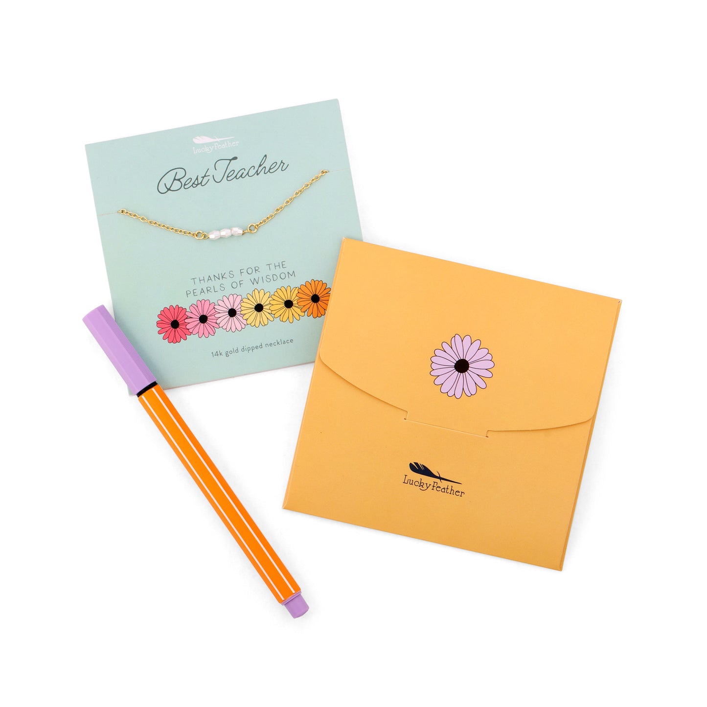 A "Best Teacher" necklace gift card and envelope lay beside a striped pen.
