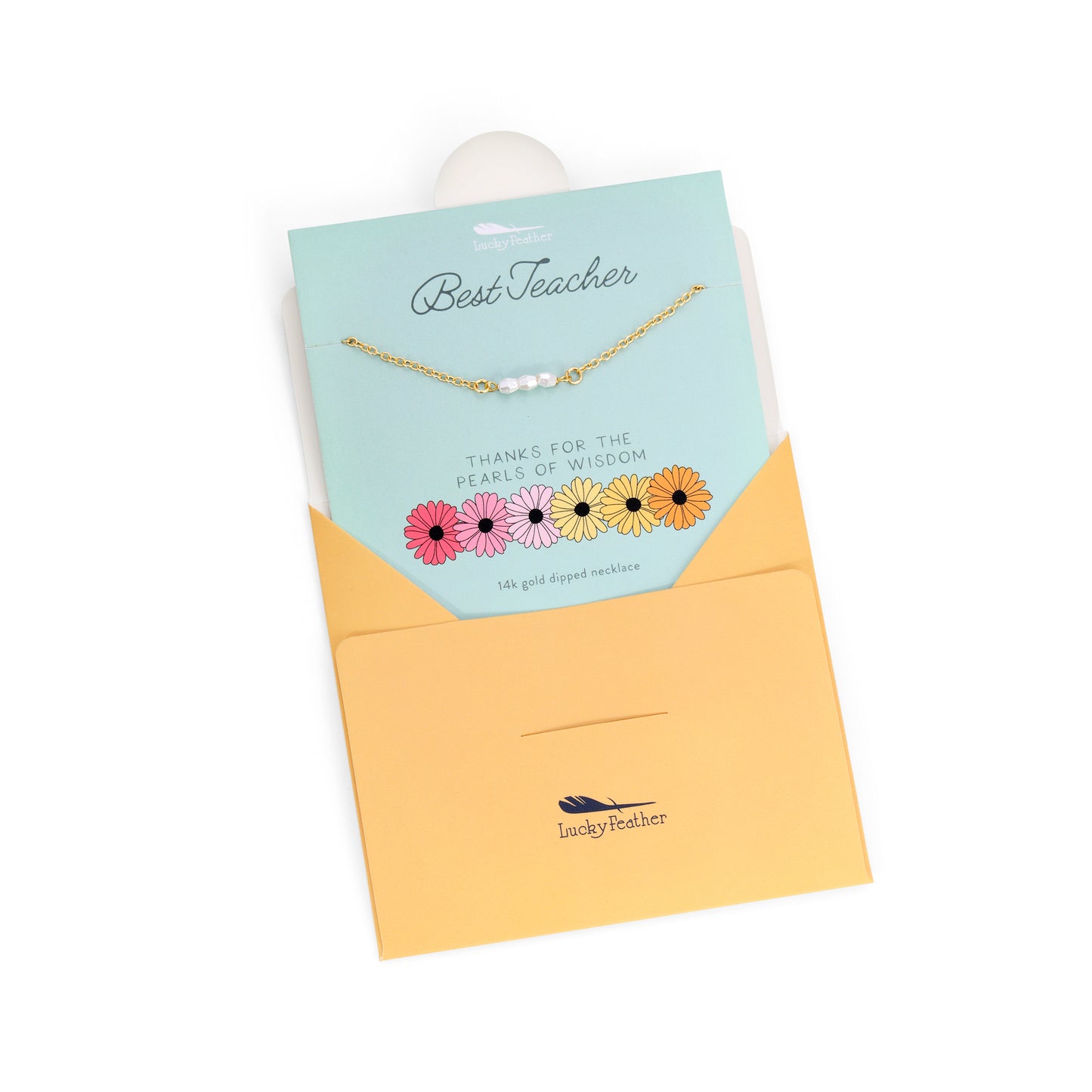 A 'Lucky Feather' branded necklace with pearls on a gift card and envelope.