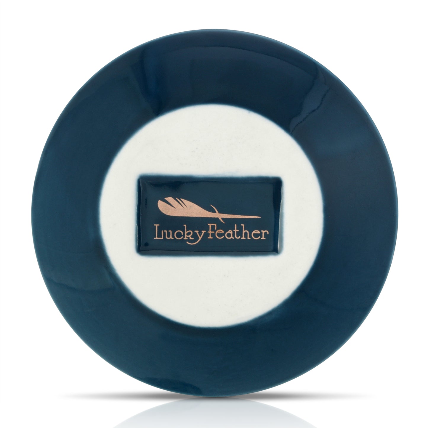 A blue and white plate with a rectangle in the middle that reads "Lucky Feather" with a feather graphic.