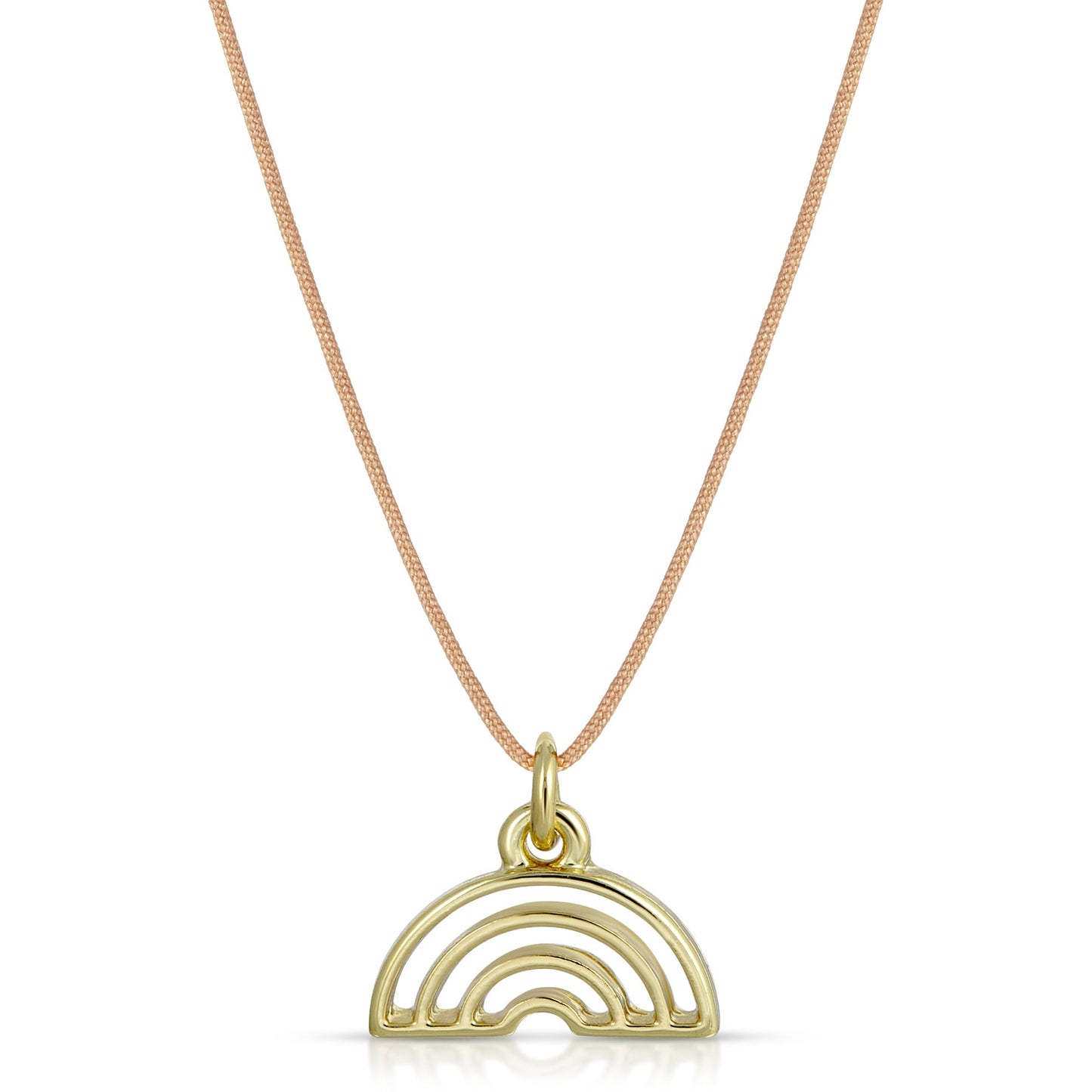 A gold-colored necklace with a rainbow pendant hangs against a white background.