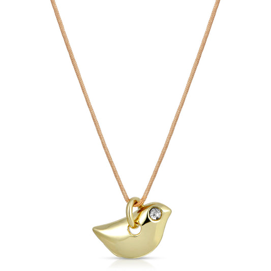 A gold bird pendant with a small crystal on a beige cord necklace.