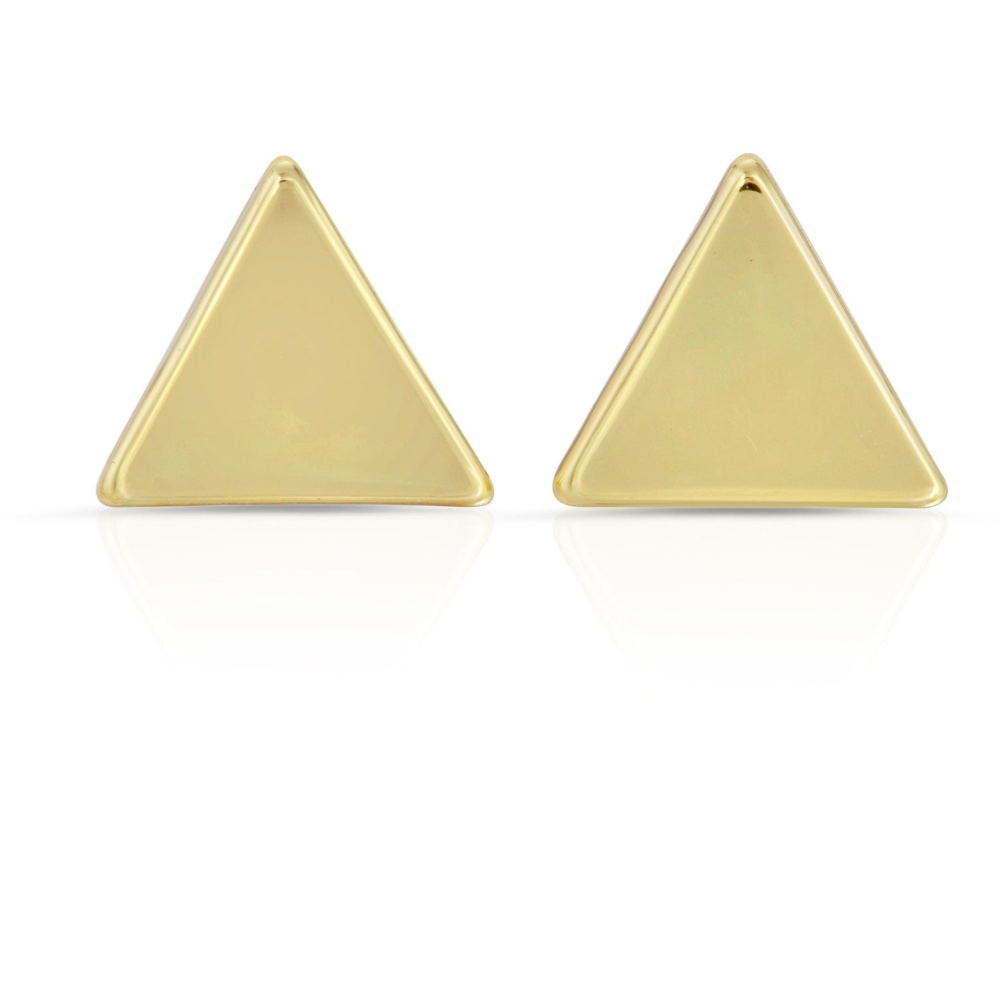 Two gold-colored triangular earrings on a white surface.